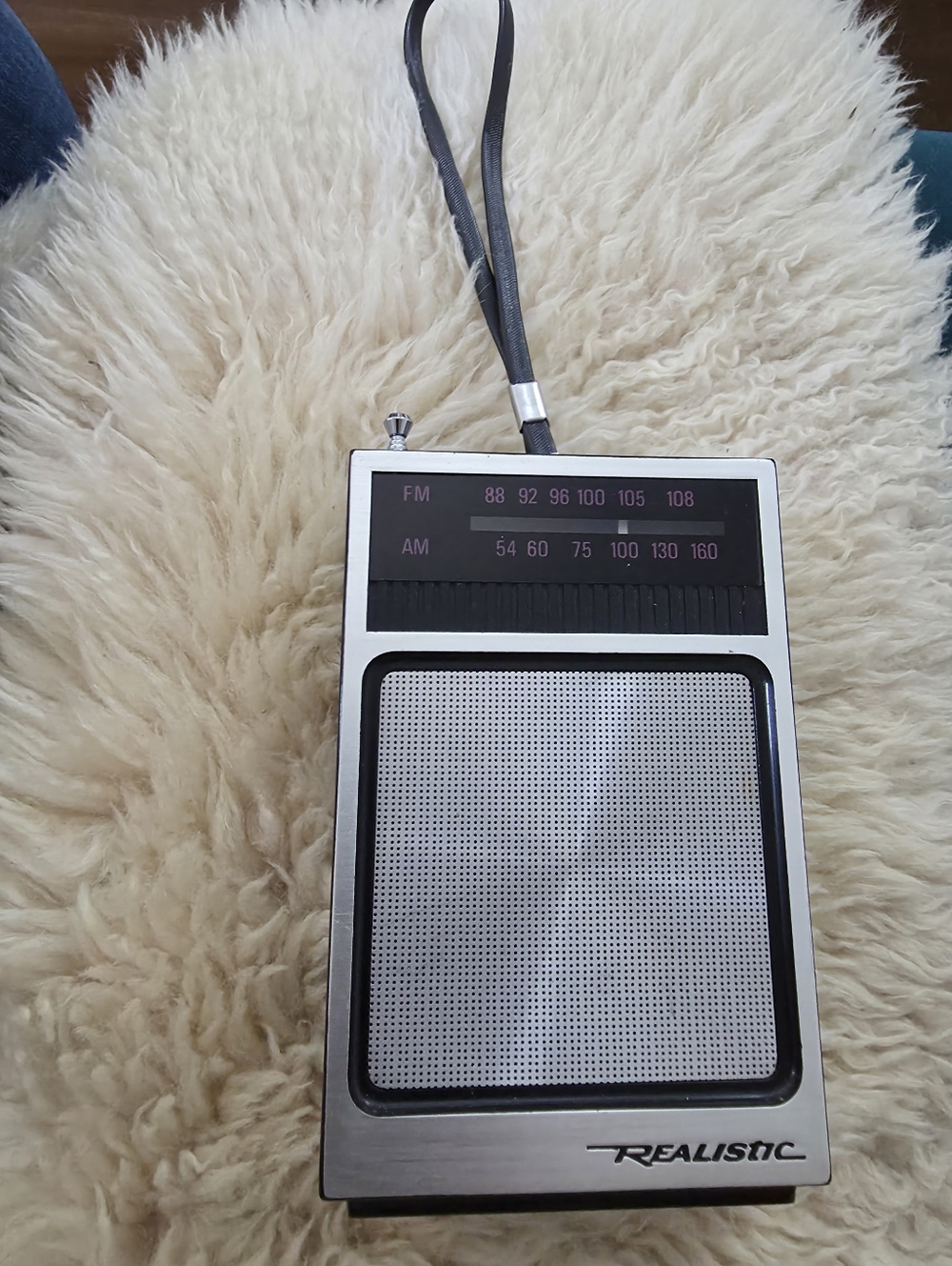 Vintage Realistic AM/FM portable transistor radio, model 12-714.